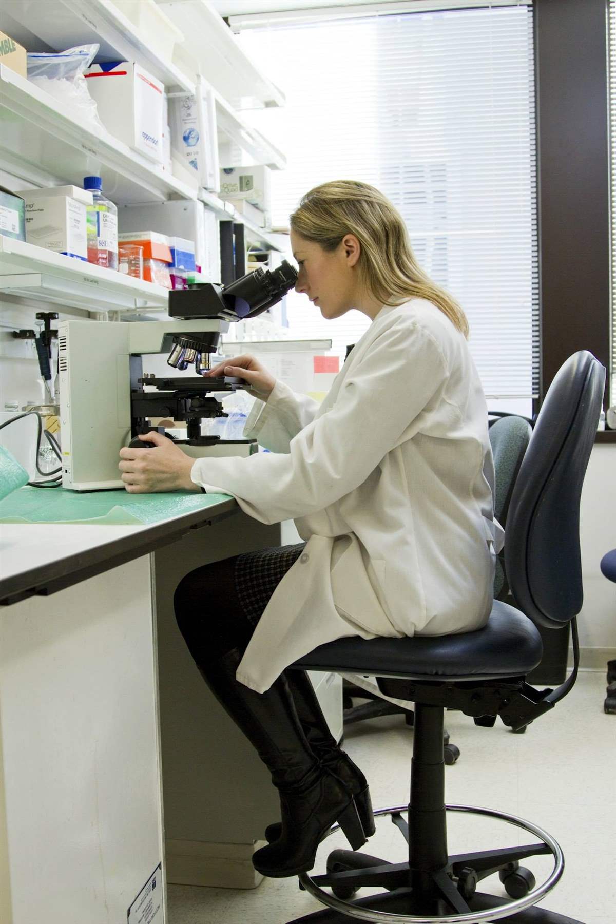 Student studying pharmacy subjects in a college library for B.Pharm admission